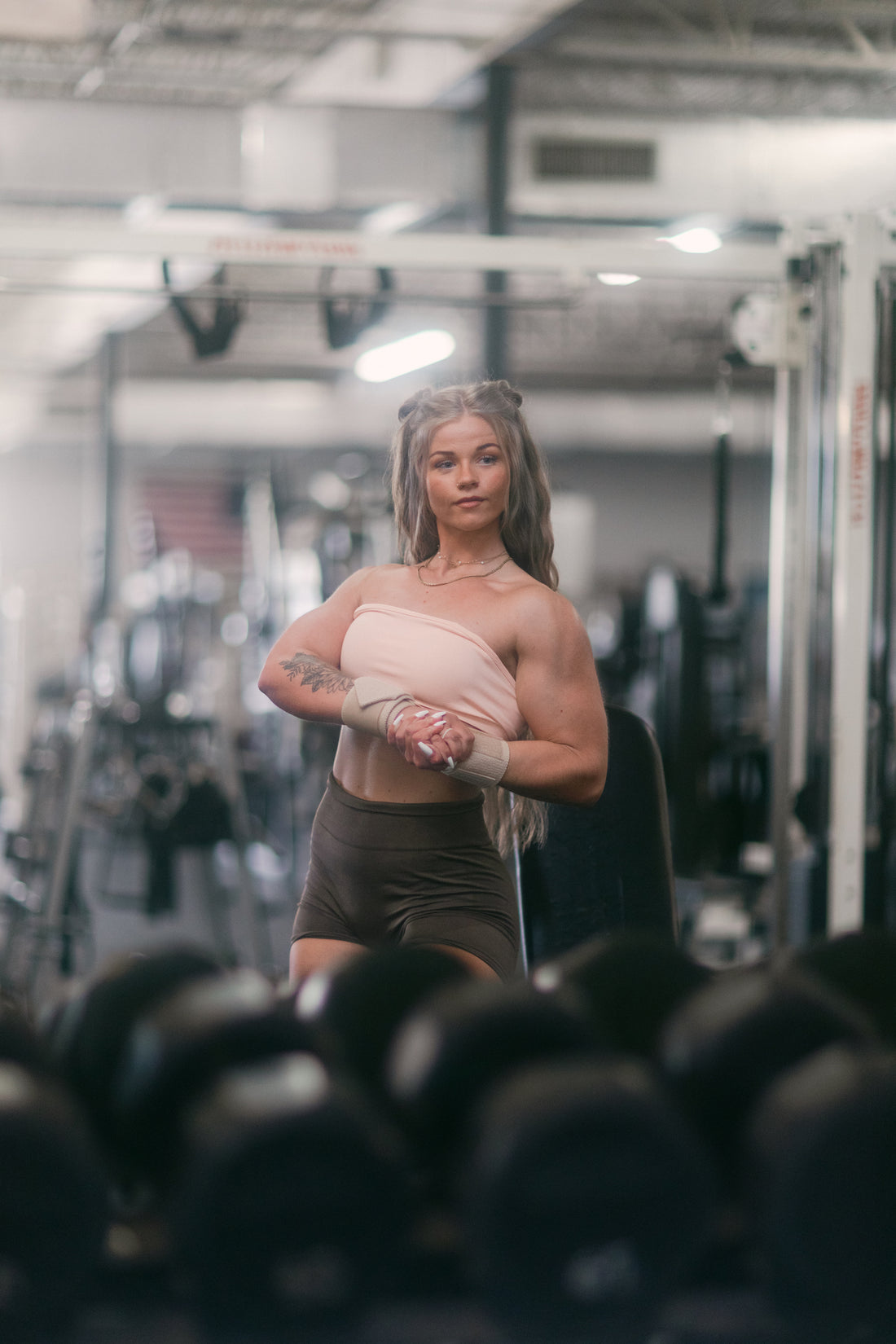 woman flexing upper arms